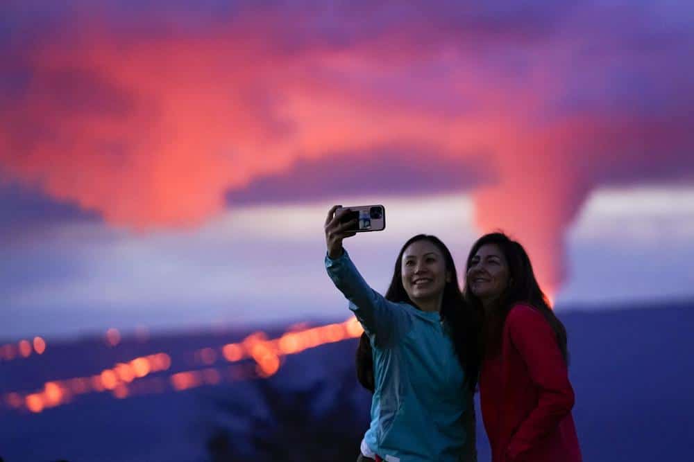 Thousands in Hawaii Flock to Watch Lava Ooze from Volcano Thousands in Hawaii Flock to Watch Lava Ooze from Volcano