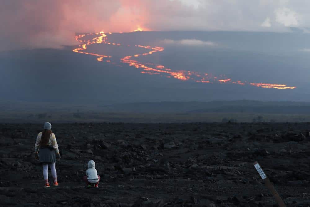 Thousands in Hawaii Flock to Watch Lava Ooze from Volcano