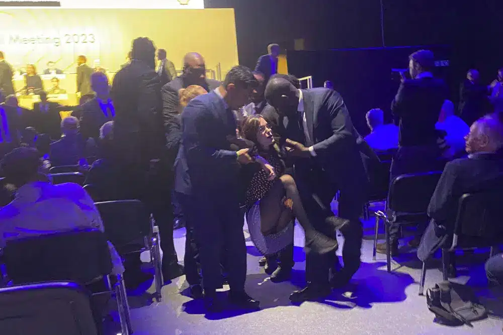 2023: Climate Protesters Dragged From Shell Shareholder Meeting As They Rush Stage shell