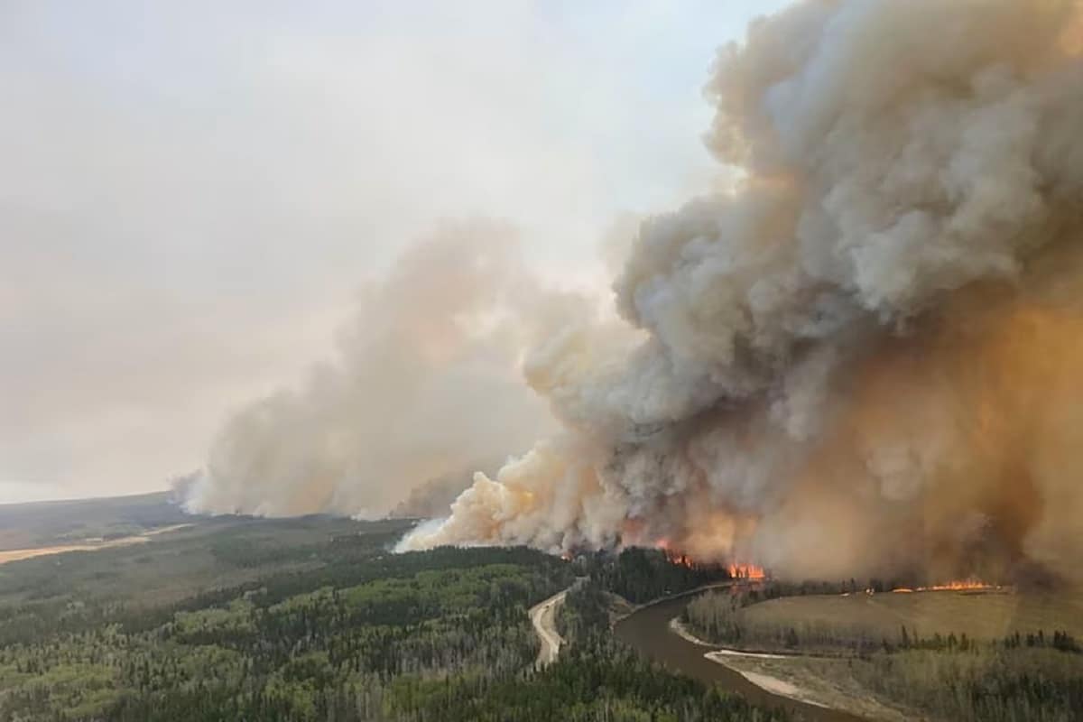 Over 24,000 People Flee Wildfires in Alberta, Canada Over 24,000 People Flee Wildfires in Alberta, Canada