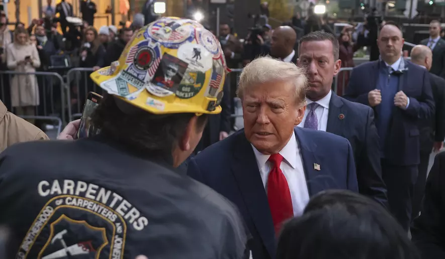 Manhattan construction site workers meet Trump