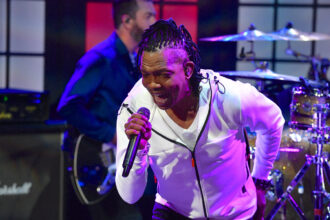 Nashville, TN – The Newsboys have stood as a major force in Christian rock for decades, sharing their music and message with millions. Their story began in Australia and grew into a worldwide success, filling arenas and shaping a unique place in Christian music. While many remember the band for their uplifting songs and positive image, recent events have added new layers to their history, especially as old allegations about former frontman Michael Tait return to public view. The group first drew attention in the late 1980s, with lively performances and lyrics that spoke to young believers. Original singer Peter Furler, alongside John James and, later, Michael Tait, helped create big hits like “Shine,” “Breakfast,” and “God’s Not Dead.” Their approach blended energetic music with messages of hope, earning them many Dove Awards and nominations for Grammys. Over time, the lineup shifted. Peter Furler, who played a key role in shaping their sound, stepped down from singing lead in 2009. Michael Tait, known from his work with DC Talk, took his place. With Tait, the group moved forward, keeping up a steady stream of albums and live shows. His style brought fresh life to the band and helped keep their popularity strong. Newsboys Stay Silent But Michael Tait’s past has come under scrutiny again. Tait has spoken about his past struggles with drugs, but recent attention has focused on allegations of sexual assault, some reaching back many years. These claims, discussed online and within Christian music circles, have not led to criminal charges, but their presence has raised concerns among fans and others in the industry. The band and Tait have mostly chosen not to comment on these recent claims, referring instead to previous statements or focusing on their music and outreach. Some feel this silence falls short of real accountability. Others believe that someone’s past, especially before joining the group, should not erase current achievements. The Newsboys continue to perform and release new songs, with Michael Tait still leading. Their concerts draw large crowds, and their faith-based message still appeals to many. Yet, questions about Tait’s history, especially the unresolved nature of the allegations, remain. The Newsboys’ journey highlights how personal lives and public careers can overlap, even in Christian music. Their successes and challenges both shape how fans see them today. As they move forward, their story remains a mix of faith, controversy, and the need for honesty and responsibility.