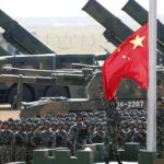 China's Military Breakthrough Claims Face Fresh Doubt as Top Scientists Disappear Xi Jinping's low-key purge of leading defense experts is raising new questions about Beijing's military technology Byline: International Defense Desk Date: March 23, 2026 A quiet but striking shake-up is rippling through China's defense establishment. Some of the country's top weapons scientists are disappearing from public view. The chief designer of the J-20 stealth fighter is gone from official records. So are senior figures tied to nuclear weapons, radar systems, and missile development. This looks like much more than a routine personnel change. The removals came soon after Chinese-made military systems reportedly failed badly in combat in Iran and Venezuela. For years, Beijing promoted major advances in stealth aircraft, hypersonic weapons, and anti-stealth radar. Now those claims are under heavier scrutiny. The key issue is no longer just corruption. It's whether some of China's most celebrated defense programs performed far below what officials promised. Leading Scientists Are Vanishing From Public Records The latest wave of removals surfaced in mid-March 2026. Profiles of senior experts suddenly disappeared from the websites of China's top scientific bodies, the Chinese Academy of Sciences (CAS) and the Chinese Academy of Engineering (CAE). The most eye-catching case is Yang Wei, the 62-year-old chief designer of the J-20 "Mighty Dragon," China's flagship fifth-generation stealth fighter. His name and biography vanished from the CAS website on March 17. Yang had already been absent from public events for more than a year. He played a central role in the J-20 program, helped work on the J-10 fighter, and later became vice president of the Aviation Industry Corporation of China (AVIC). Soon after, three more major names disappeared from the CAE roster: * Zhao Xiangeng, 72, a former CAE vice president and a leading expert in China's nuclear weapons program * Wu Manqing, 60, a radar specialist and head of China Electronics Technology Group Corporation (CETC), which developed systems such as the JY-27A anti-stealth radar * Wei Yiyin, 63, a chief designer tied to advanced surface-to-air missile systems sold abroad Chinese media reports say at least 10 academicians have been removed since the 2022 Party Congress. Officials have offered no public explanation. There have been no clear statements, no formal notices, only silent deletion from state-run records. Key figures reportedly removed include: * The chief designer of the J-20 stealth fighter * A senior leader in the nuclear weapons program * A top radar technology official * A leading missile systems designer Xi Jinping has carried out major purges before. The People's Liberation Army Rocket Force lost senior generals in corruption cases in 2023 and 2024. Still, going after the scientists behind the weapons themselves marks a more serious and unsettling step. Combat Setbacks in Iran and Venezuela Deepened the Pressure The timing has drawn intense attention because these removals followed reported battlefield failures involving Chinese-made systems. In January 2026, during Operation Absolute Resolve in Venezuela, Chinese JY-27A anti-stealth radars reportedly failed to detect incoming U.S. aircraft. These radars had been advertised as capable of tracking stealth fighters such as the F-35 and F-22 from long range. Yet reports say more than 150 aircraft entered Venezuelan airspace without being stopped. Chinese HQ-9B air defense systems launched missiles but failed to score hits. The operation ended with President Maduro's capture, a major embarrassment for governments that had trusted Chinese military exports. Then came the strikes on Iran in early March 2026 during Operation Epic Fury. U.S. and Israeli forces hit high-level targets despite multiple layers of Chinese-made air defenses. Iranian leaders, including Khamenei, and many senior officers were reportedly killed. Western analysts said the Chinese systems performed so poorly that they were effectively useless under combat pressure. Even some Chinese state media voices offered muted criticism of their performance. Earlier setbacks in Pakistan added to the damage. Reports there also suggested that Chinese HQ-9B defenses could not stop advanced strike packages. As a result, systems once presented as strong alternatives to Western weapons began to look far less convincing. These were not training drills or ceremonial displays. They were real operations. They came one after another, and they exposed weaknesses that had been easy to overlook on paper. Because of that, defense analysts now question whether China's military advances were overstated from the start. Did Beijing Oversell Its Military Technology? China has spent huge sums on military modernization. State media said the J-20 could compete directly with the U.S. F-35. Officials praised hypersonic missiles as threats to American carriers. Anti-stealth radars were supposed to cancel out the advantage of stealth aircraft. Nuclear programs were presented as a stronger shield against outside pressure. Now the purge hints at deeper trouble. Corruption remains one possible reason. Xi's anti-corruption campaign has already brought down defense ministers and Rocket Force leaders. Some scientists may have diverted research funds or approved weak programs. There are also reports suggesting false test data or heavy reliance on foreign technology that did not deliver the promised results. Still, the problem may run deeper than graft. China's defense sector depends heavily on large state-owned firms such as AVIC and CETC. In that system, political loyalty can carry as much weight as engineering results. Controlled testing can hide flaws for years. Combat does not. Once these systems face jamming, saturation attacks, and full operational stress, design gaps become harder to hide. One Chinese military commentator reportedly called the Iran result a national humiliation. Another pointed out that radar detection itself broke down under U.S. electronic warfare pressure. Western officials have been blunt. One U.S. defense source, speaking anonymously, said China's systems often look strong in brochures and military parades, but collapse when faced with stealth aircraft and precision strikes. The sequence has fueled suspicion. Yang Wei's profile disappeared only days after the Iran strikes. Other experts in missile and nuclear fields vanished around the same time. To many observers, Beijing appears to be looking for people to blame, or trying to silence those who know how the systems actually performed. The Purge Fits Xi Jinping's Wider Style of Control This campaign matches Xi's broader approach to power. Since taking office, he has pushed for total loyalty across the military and state system. His message has been clear, no one is untouchable. Removing names from academy websites follows a familiar pattern in China. It often signals disgrace before any formal charges appear. Families say little. Colleagues stay quiet. In some cases, others linked to the same projects also disappear from view. One report even claimed Yang Wei faced execution after a J-20 test flight went badly in front of Xi, though no major outlet has confirmed that account. What stands out is the pattern. Since 2022, at least 10 senior academicians have reportedly been removed. Many come from the same sectors China has used to promote its military rise: * Stealth aircraft * Nuclear deterrence * Advanced radar systems * Missile defense That focus does not look random. It looks targeted. Global Buyers Are Reassessing Chinese Weapons The fallout goes well beyond China's borders. Countries that bought Chinese systems, including Pakistan, Iran, and Venezuela, now have reason to review those purchases. Other states that were considering the HQ-9B or related systems may start looking elsewhere, including Russia or Western suppliers. For the United States and its allies, the recent combat results support a point they have made for years. Western stealth aircraft, electronic warfare, and integrated strike systems still hold a strong edge. The gap with China may not be shrinking. It may be growing. At the same time, Beijing has not changed its public message. State media still praises the J-20 and other headline weapons. Military displays continue. Official rhetoric remains confident. Yet behind the scenes, the disappearance of top scientists points to anxiety inside the system. What Comes Next, More Purges or Real Change? It is still unclear how far this campaign will go. Xi now holds more power than any Chinese leader in years. He could replace removed experts with more politically reliable figures, even if that weakens technical standards. There is another possibility. The shock of recent failures could force a hard reset. China might invest more in realistic testing, better system integration, and tighter oversight of defense spending. For now, the signs point to damage control, not open reform. Scientists are disappearing. Doubts about China's military technology are spreading. And the country's image as a rising defense powerhouse is starting to crack under the weight of real combat results. The J-20 was meant to reshape air warfare. Its chief designer has now been erased from official records. Experts tied to China's nuclear deterrent are gone. Leading figures in radar and missile programs have disappeared as well. This is not a simple reshuffle. It is a serious test of China's military credibility. As one analyst put it, when a country's top scientists vanish right after its top weapons fail, the issue may be much bigger than corruption. It may signal the collapse of a carefully built myth.