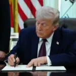 Trump signs executive order limiting mail-in ballots