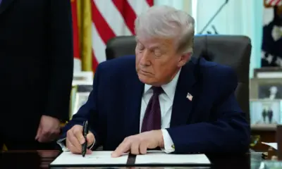 Trump signs executive order limiting mail-in ballots